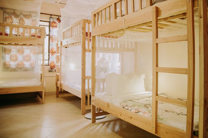Imagen de la habitación del Hotel White House of Tanzania - Hostel. Foto 6