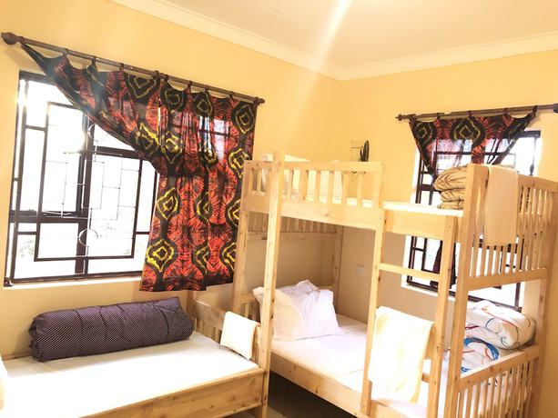 Imagen de la habitación del Hotel White House of Tanzania - Hostel. Foto 8