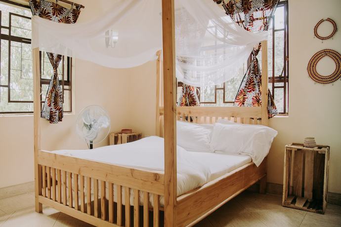 Imagen de la habitación del Hotel White House of Tanzania - Hostel. Foto 9