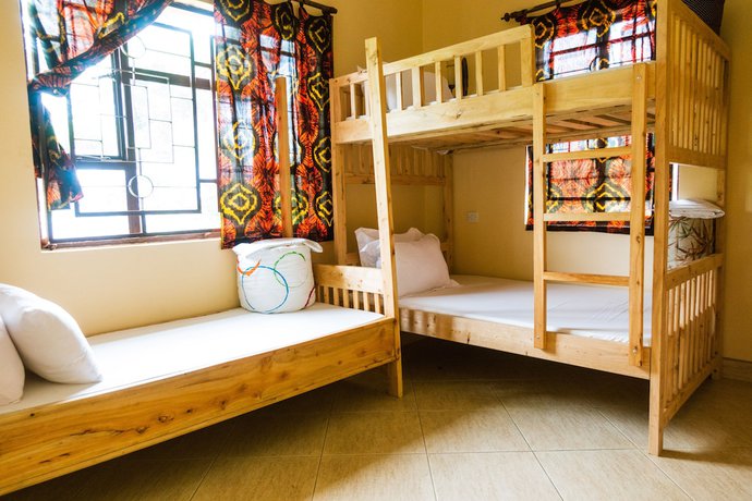 Imagen de la habitación del Hotel White House of Tanzania - Hostel. Foto 11