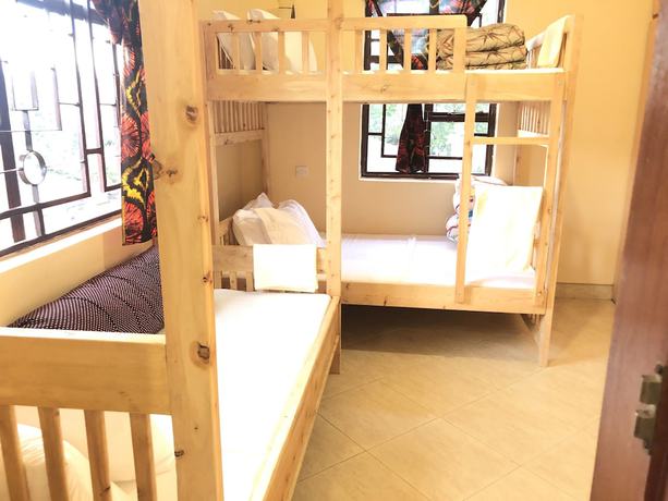 Imagen de la habitación del Hotel White House of Tanzania - Hostel. Foto 13