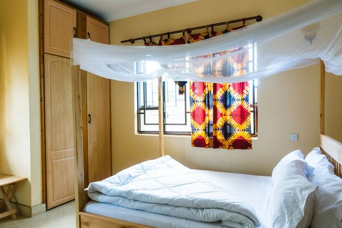 Imagen de la habitación del Hotel White House of Tanzania - Hostel. Foto 18