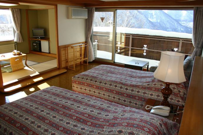Imagen de la habitación del Hotel White Inn Kitashiga. Foto 13