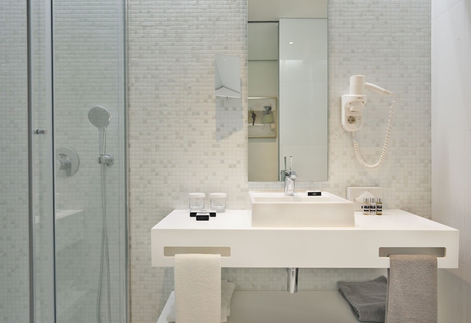 Imagen de la habitación del Hotel White Lisboa. Foto 17