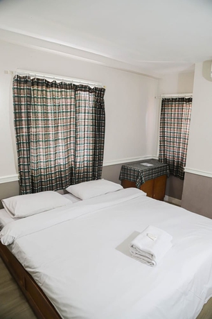 Imagen de la habitación del Hotel White Lodge, Bangkok. Foto 8