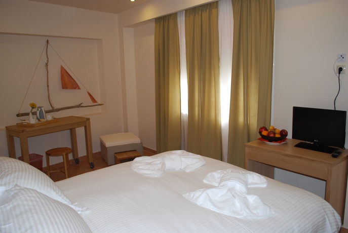 Imagen de la habitación del Hotel White Lotus Luxury Accommodation. Foto 15