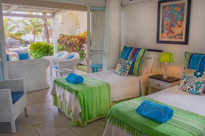 Imagen de la habitación del Hotel White Oaks Villas. Foto 2