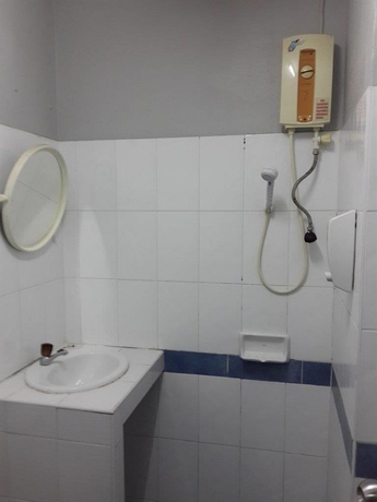 Imagen de la habitación del Hotel White Orchid Inn. Foto 2