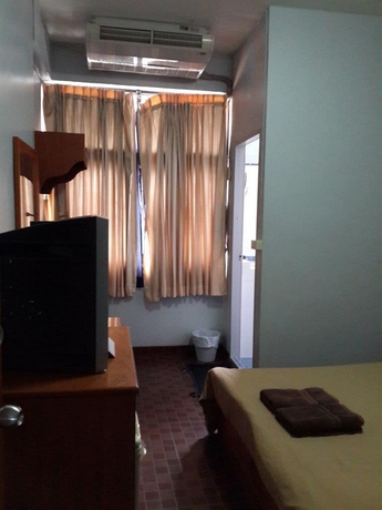 Imagen de la habitación del Hotel White Orchid Inn. Foto 6