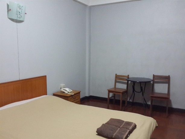 Imagen de la habitación del Hotel White Orchid Inn. Foto 7