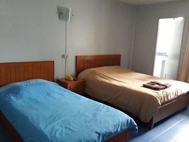 Imagen de la habitación del Hotel White Orchid Inn. Foto 9
