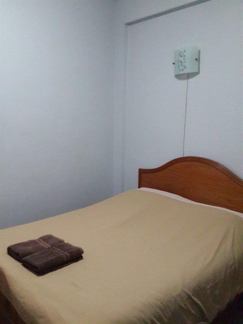Imagen de la habitación del Hotel White Orchid Inn. Foto 10
