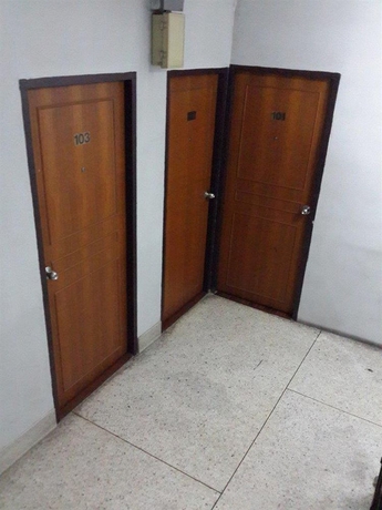 Imagen de los interiores del Hotel White Orchid Inn. Foto 14