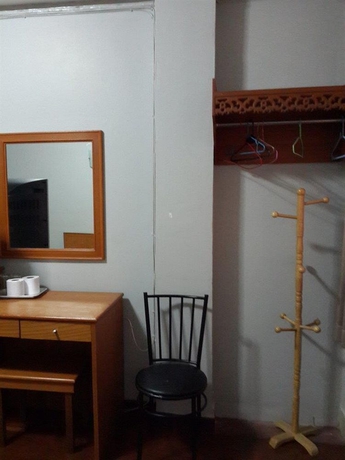 Imagen de la habitación del Hotel White Orchid Inn. Foto 12