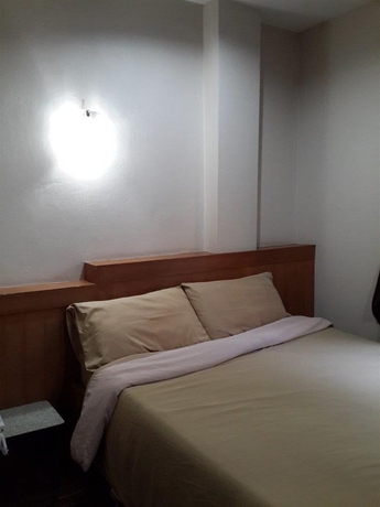 Imagen de la habitación del Hotel White Orchid Inn Ii. Foto 9