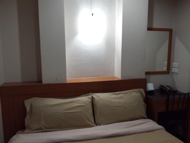 Imagen de la habitación del Hotel White Orchid Inn Ii. Foto 11