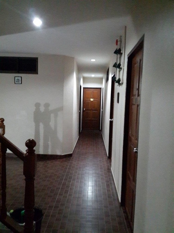 Imagen de los interiores del Hotel White Orchid Inn Ii. Foto 14