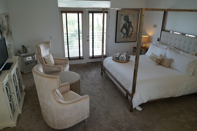 Imagen de la habitación del Hotel White Orchid Inn and Spa. Foto 13