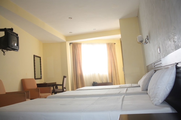 Imagen de la habitación del Hotel White Palace, Antananarivo. Foto 3