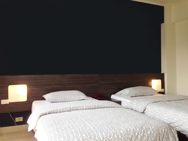 Imagen de la habitación del Hotel White Palace Bangkok. Foto 3