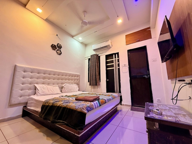 Imagen de la habitación del Hotel White Palace, Rajkot. Foto 2