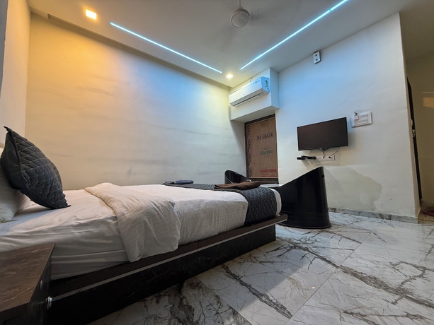 Imagen de la habitación del Hotel White Palace, Rajkot. Foto 4