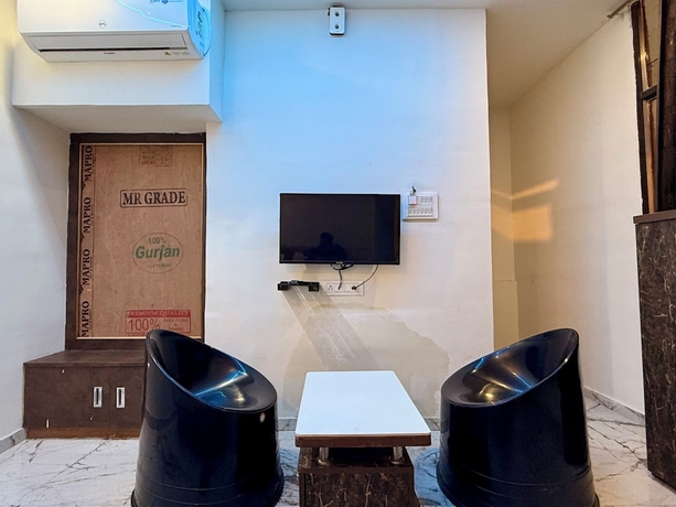 Imagen de la habitación del Hotel White Palace, Rajkot. Foto 9