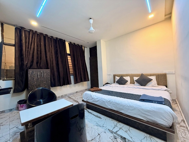 Imagen de la habitación del Hotel White Palace, Rajkot. Foto 11
