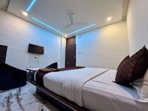 Imagen de la habitación del Hotel White Palace, Rajkot. Foto 12