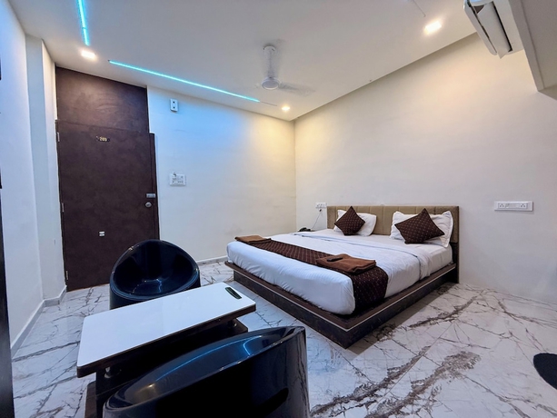 Imagen de la habitación del Hotel White Palace, Rajkot. Foto 13