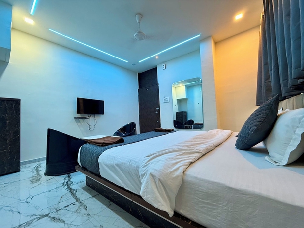 Imagen de la habitación del Hotel White Palace, Rajkot. Foto 14