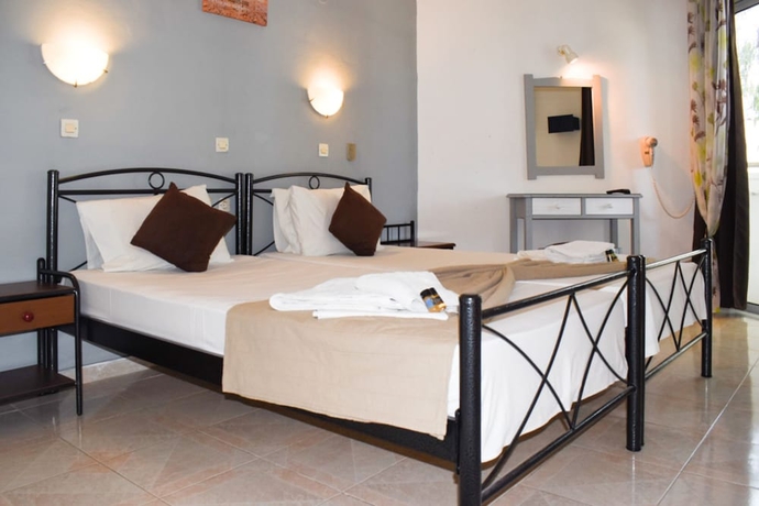 Imagen de la habitación del Hotel White Palace Studios. Foto 14