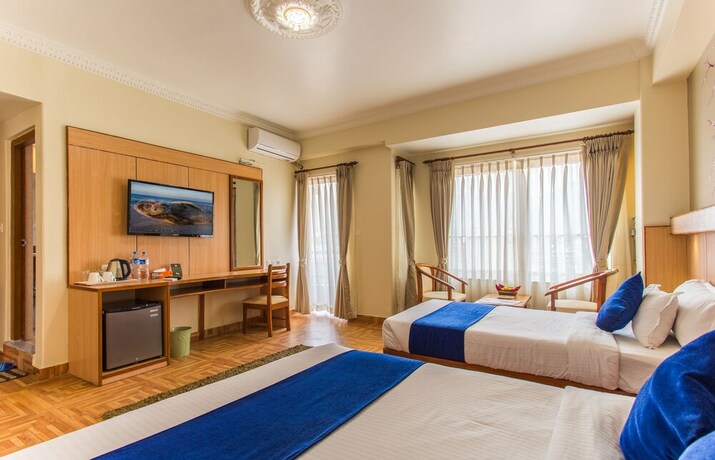 Imagen de la habitación del Hotel White Pearl, Pokhara. Foto 18