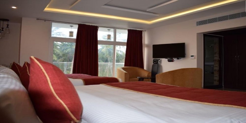 Imagen de la habitación del Hotel White Pearl Residency. Foto 3