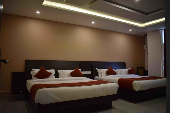 Imagen de la habitación del Hotel White Pearl Residency. Foto 9