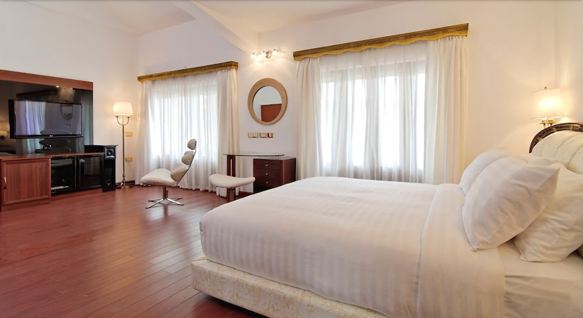 Imagen de la habitación del Hotel White Pearl Suites. Foto 5
