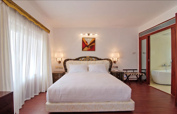 Imagen de la habitación del Hotel White Pearl Suites. Foto 9