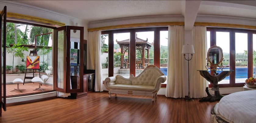 Imagen de la habitación del Hotel White Pearl Suites. Foto 11