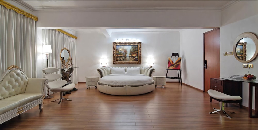 Imagen de la habitación del Hotel White Pearl Suites. Foto 12