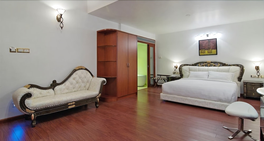 Imagen de la habitación del Hotel White Pearl Suites. Foto 13