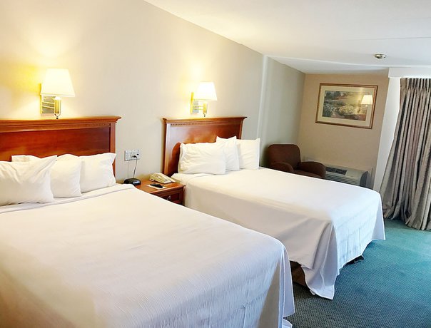 Imagen de la habitación del Hotel White River Inn and Suites. Foto 6