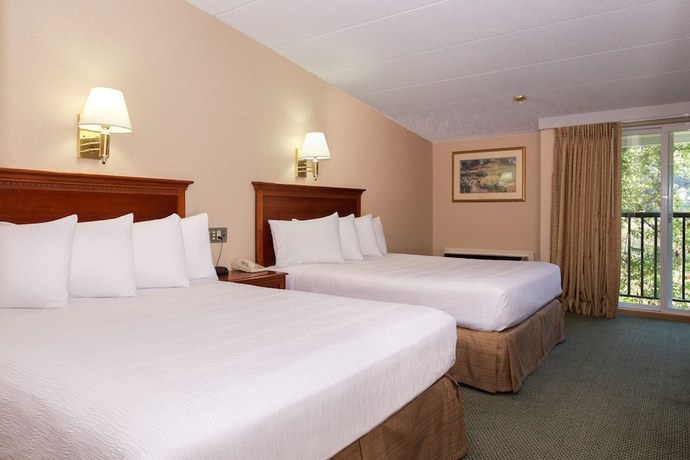 Imagen de la habitación del Hotel White River Inn and Suites. Foto 8