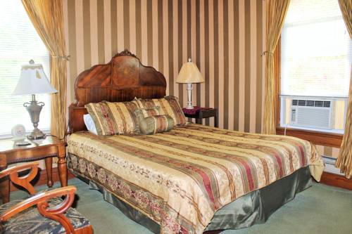 Imagen de la habitación del Hotel White Rose Inns, Wisconsin Dells. Foto 10