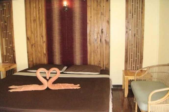 Imagen del bar/restaurante del Hotel White Sand Beach Resort. Foto 5