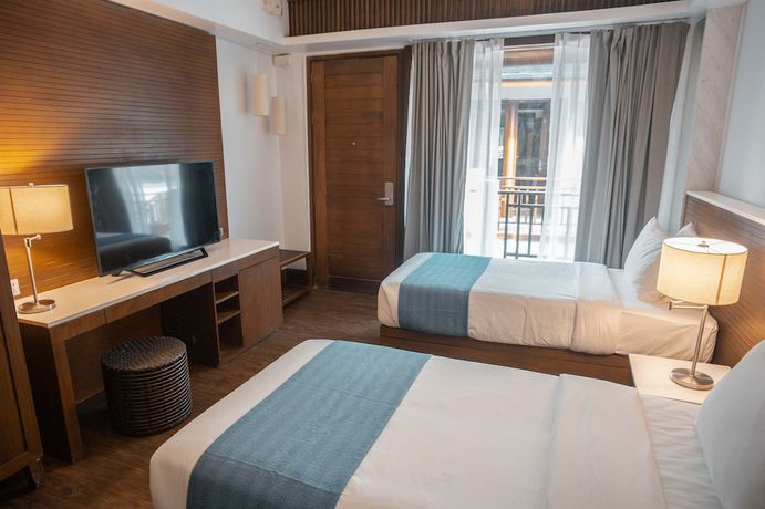 Imagen de la habitación del Hotel White Sand Boracay. Foto 8