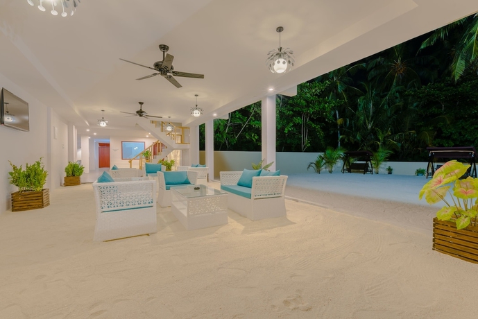 Imagen de la habitación del Hotel White Sand Dhigurah. Foto 3