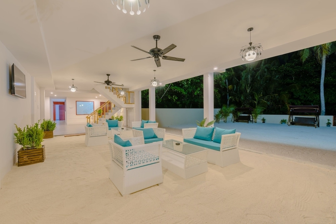 Imagen de la habitación del Hotel White Sand Dhigurah. Foto 4