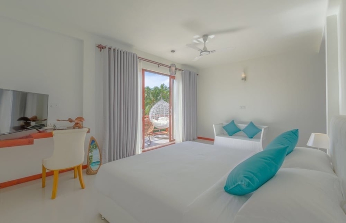 Imagen de la habitación del Hotel White Sand Dhigurah. Foto 10