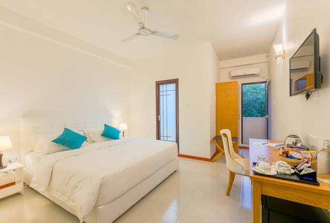 Imagen de la habitación del Hotel White Sand Dhigurah. Foto 13