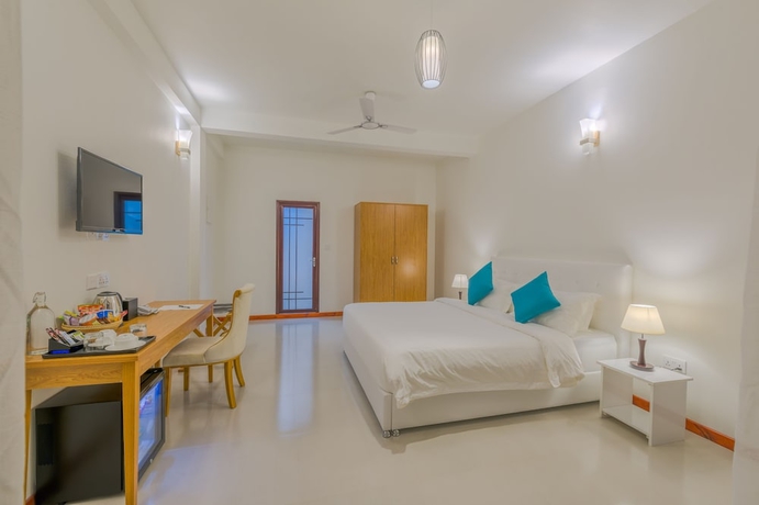 Imagen de la habitación del Hotel White Sand Dhigurah. Foto 15